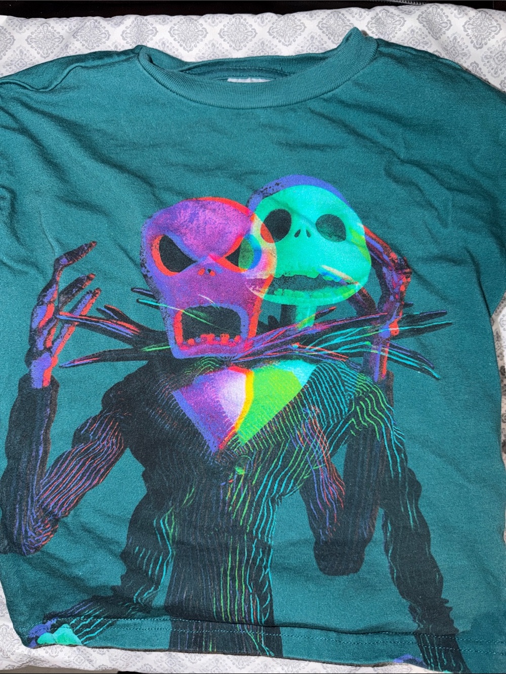 Teal Graphic Tee with Neon Jack Skellington Print